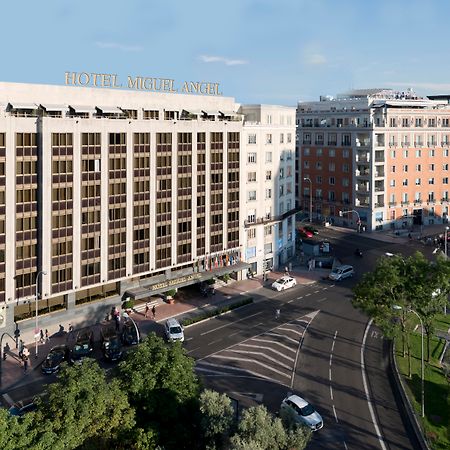 Hotel Miguel Angel Madrid Bagian luar foto The building of the university library