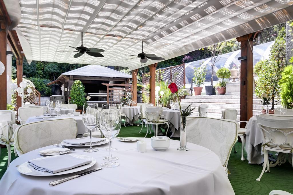 Hotel Miguel Angel Madrid Bagian luar foto The restaurant